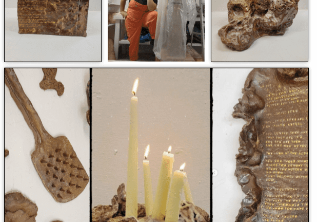 Candles on textured sculptures and tools displayed.